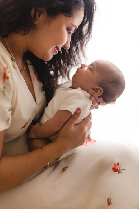 mother holding baby