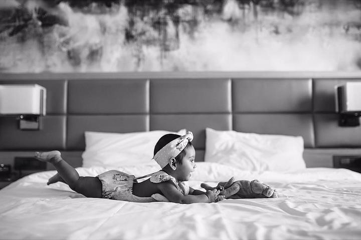 black and white baby in bedroom